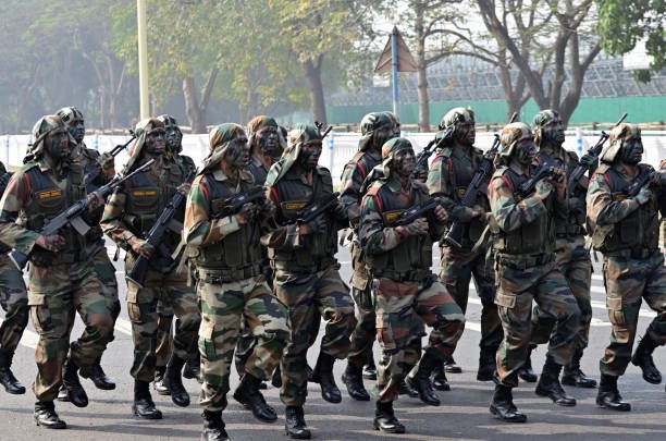 Indian Armed Forces marching with gun